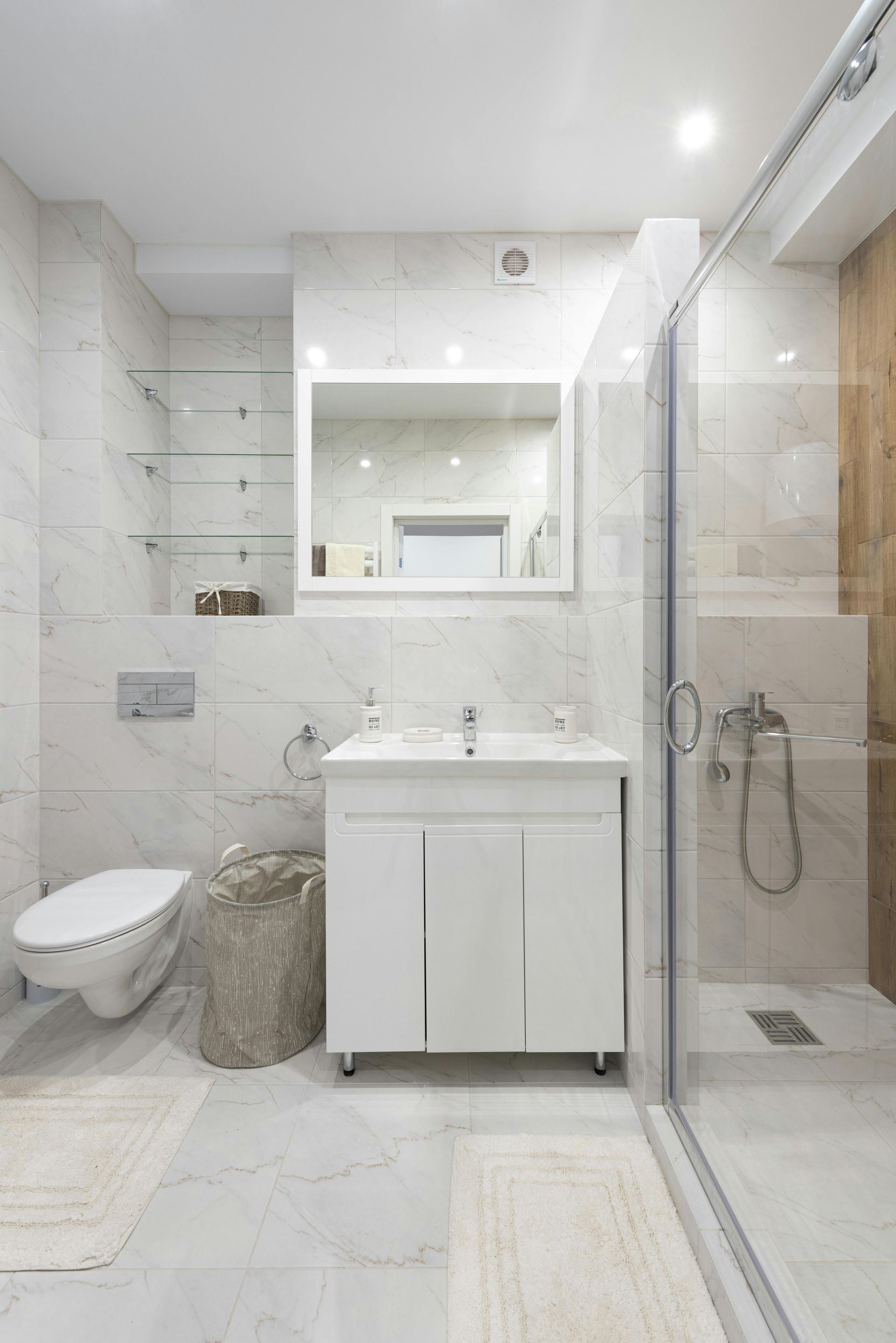 Custom bath vanity in a marble bathroom