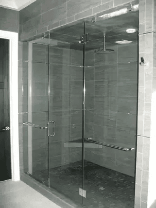 Custom frameless glass shower with grab bars